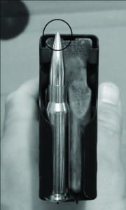 Figure 3.  Illustration of a bullet being seated out of the case too far to feed thru a magazine.